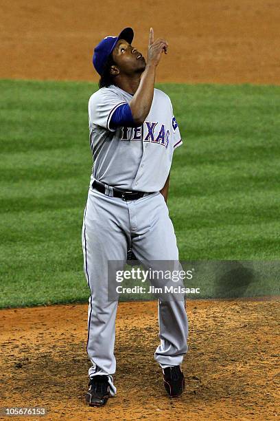 Neftali Feliz of the Texas Rangers reacts after he recorded the final out in the Rangers 8-0 win against the New York Yankees in Game Three of the...