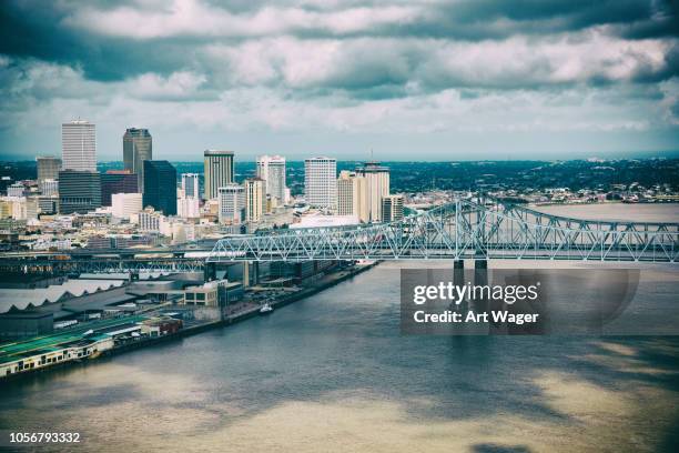 downtown new orleans skyline aerial - new orleans bridge stock pictures, royalty-free photos & images