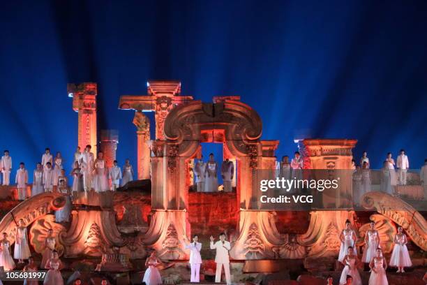 Actors perform during the marking of the 150th anniversary of the imperial garden being sacked by the British and French occupying forces in 1860...