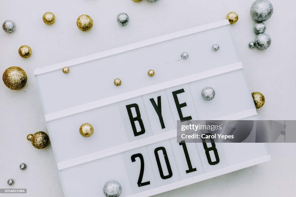 Bye 201  message in lightbox with silver and golden decorations