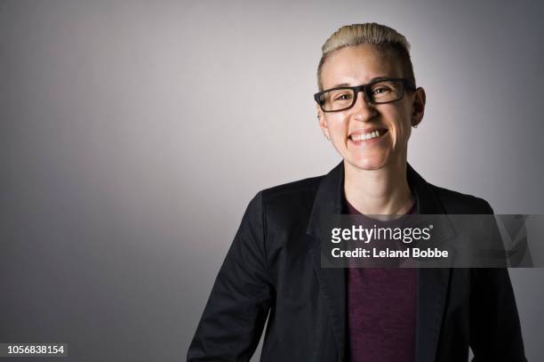 portrait of non-binary person - androgynous stock pictures, royalty-free photos & images