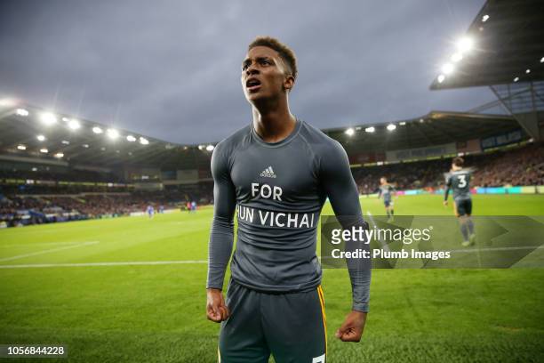 Demarai Gray of Leicester City celebrates in a t shirt to honour the Clubs late chairman Vichai Srivaddhanaprabha after scoring to make it 0-1 during...