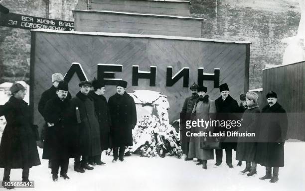 Polish-born Felix Edmundovich Dzerzhinsky near Lenin's temporary mausoleum, 1924. Also in the group are Vyacheslav Molotov, Avel Enukidze, Muralov,...