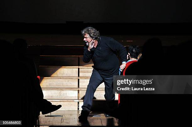 Italian comedian, blogger and political activist Beppe Grillo performs during one of his shows at the Teatro Goldoni on October 18, 2010 in Livorno,...