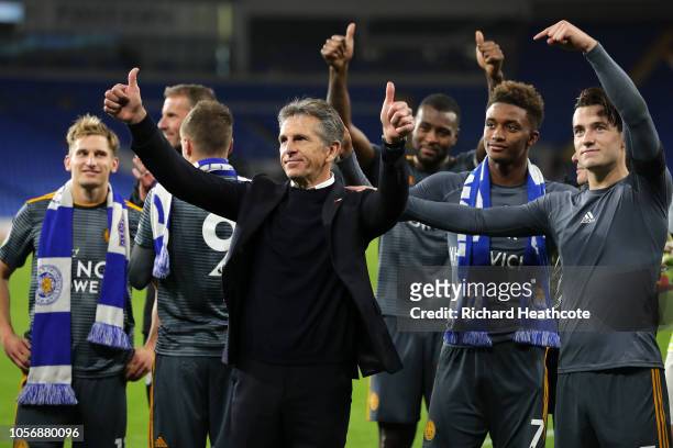 Claude Puel, Manager of Leicester City, Demarai Gray of Leicester City and Ben Chilwell of Leicester City acknowledge the fans after the Premier...