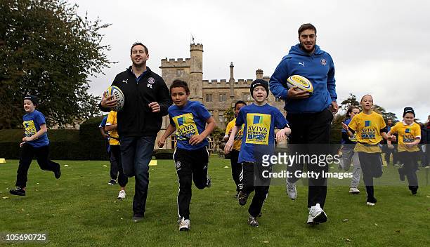 Butch James and Matt Banahan of Bath running with children from Batheaston Primary School and St. Andrews Primary School during the National Launch...