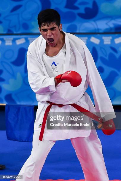 Navid Mohammadi of Iran celebrates winning the Gold Medal in the Men's Kumite +68kg Final Bout against and Nabil Ech-Chaabi of Morocco during day 12...