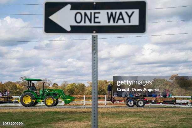 Tractors pulling hayrides are seen during Franklin Family Day at Harlinsdale Farm, November 3, 2018 in Franklin, Tennessee. Marsha Blackburn, who...