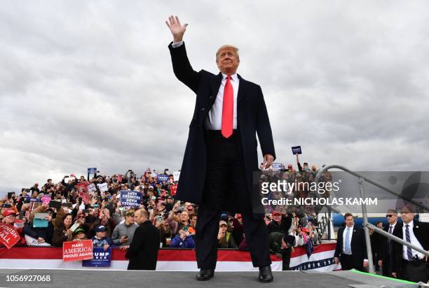 President Donald Trump arrives for a "Make America Great Again" rally at Bozeman Yellowstone International Airport, November 3, 2018 in Belgrade,...