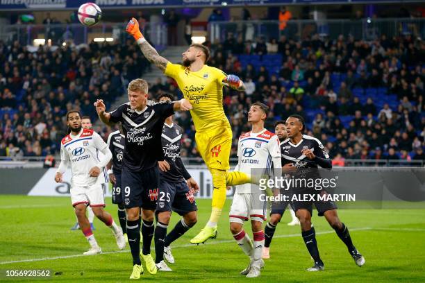 Bordeaux's French goalkeeper Benoit Costil makes a save during the French L1 football match between Olympique Lyonnais and Girondins de Bordeaux on...