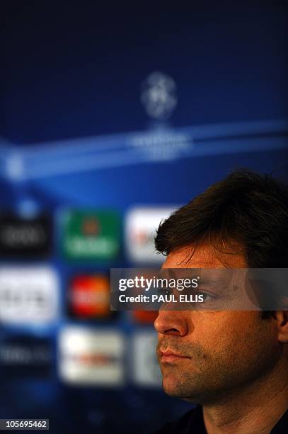 Bursaspor manager Ertugrul Saglam listens to questions ahead of a training session at Old Trafford in Manchester, north-west England on October 19,...
