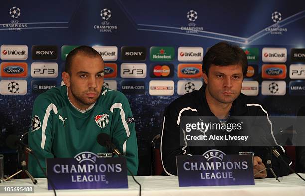 Ertugrul Saglam the coach of Buraspor and Sercan Yildirim face the media during a press conference at Old Trafford on October 19, 2010 in Manchester,...