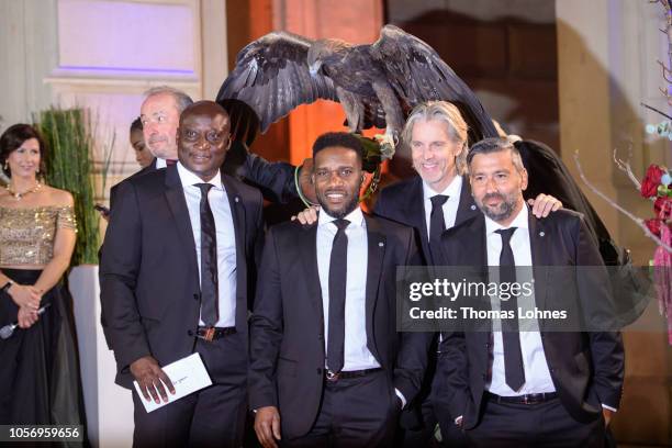 Football legends of Eintracht Frankfurt Anthony Yeboah, Jay-Jay Okocha, Jan Age Fiortoft and Oka Nikolov and Eintracht Frankfurt mascot eagel Attila...