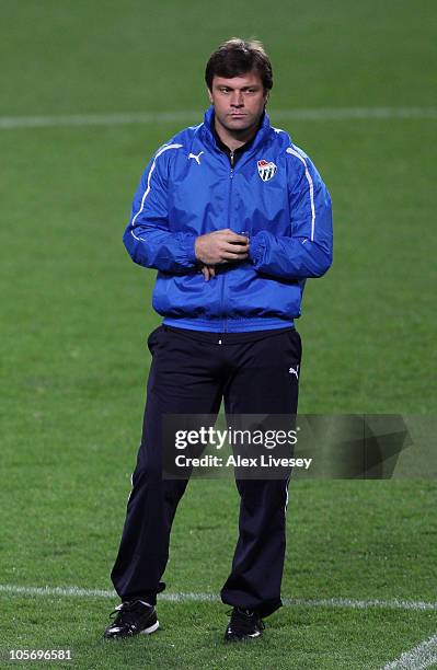 Ertugrul Saglam the coach of Buraspor looks on during a training session at Old Trafford on October 19, 2010 in Manchester, England.