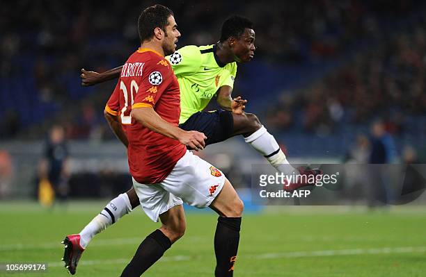 Basel's defender Samuel Inkoom shoots and scores past AS Roma's midfielder Simone Perrotta during their champions league football match at the...