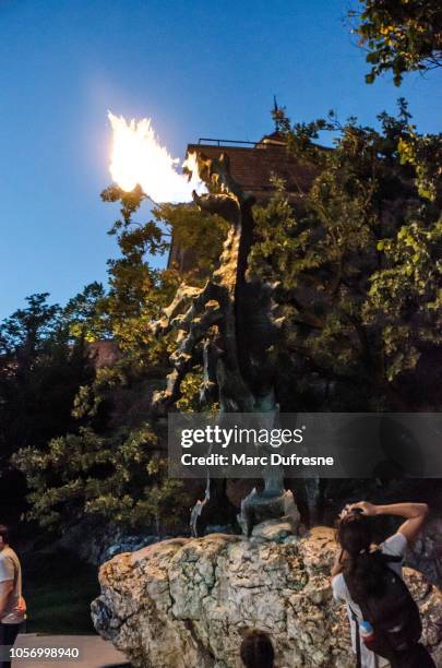 wawel dragon spitting fire in krakow, poland during summer night - krakow stock pictures, royalty-free photos & images