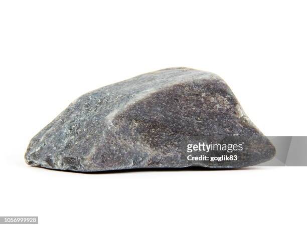 close-up of rock against white background - rock object stock pictures, royalty-free photos & images