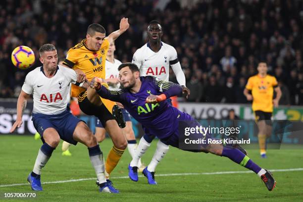 Hugo Lloris of Tottenham Hotspur makes a save from Conor Coady of Wolverhampton Wanderers during the Premier League match between Wolverhampton...