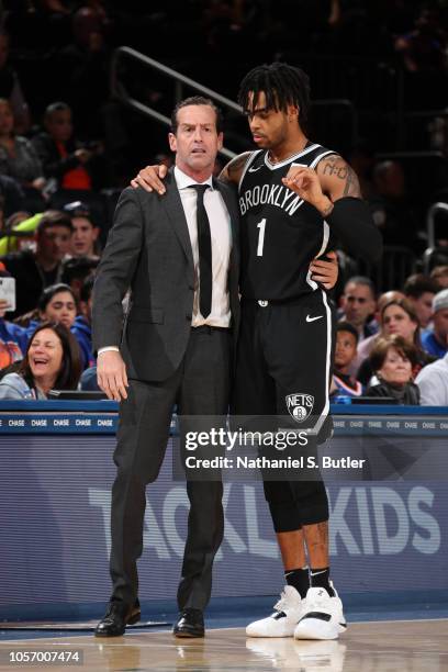 Head Coach Kenny Atkinson and D'Angelo Russell of the Brooklyn Nets chat during the game against the New York Knicks on October 12, 2018 at Madison...