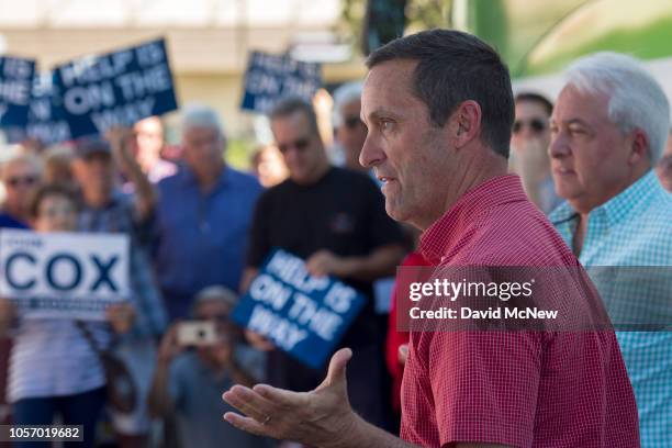 Rep. Steve Knight speaks as Republican gubernatorial candidate John Cox looks on during a get-out-the-vote rally on November 3, 2018 in Santa...