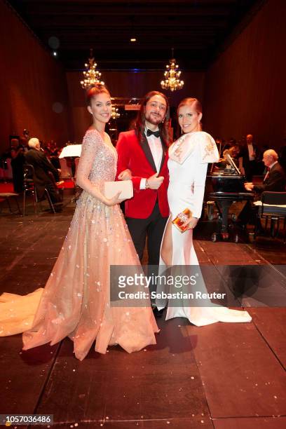 Paulina Swarovski, Riccardo Simonetti and Victoria Swarovski attend the 25th Opera Gala aftershow party at Deutsche Oper Berlin on November 3, 2018...