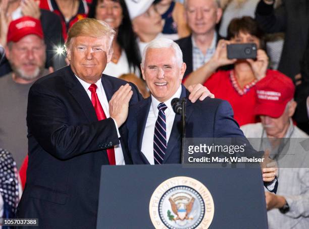 President Donald Trump and Vice President Mike Pence at a campaign rally at the Pensacola International Airport on November 3, 2018 in Pensacola,...