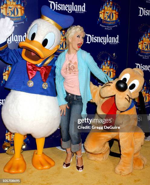 Christina Aguilera with Pluto and Donald Duck during Disneyland 50th Anniversary "Happiest Homecoming On Earth" Celebration at Disneyland in Anaheim,...