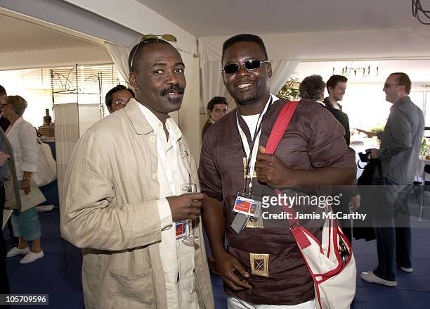 Mahamat-Saleh Haroun and Leon Fuanga during 2005 Cannes Film Festival - Young Director's Lunch at International Pavilion in Cannes, France.