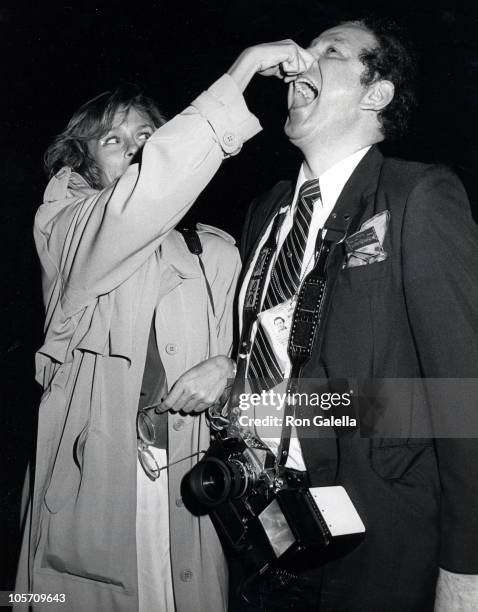 Lauren Hutton and Ron Galella during "Starflight" Los Angeles Premiere at The Academy Theater in Beverly Hills, California, United States.