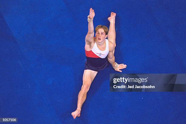 Morgen Hamm of the USA in the Finals of the Mens Floor Exercise at the Sydney Superdome on Day Nine of the Sydney 2000 Olympic Games in Sydney,...