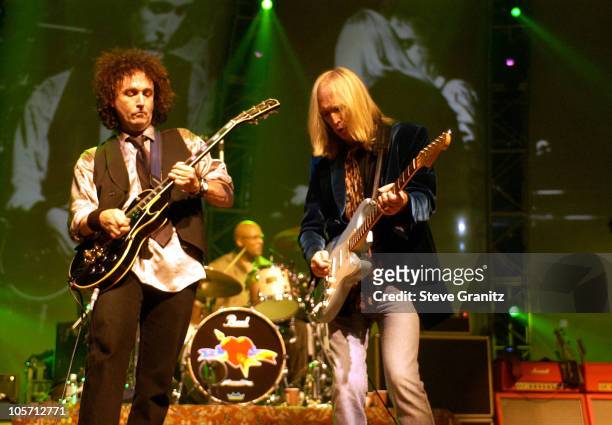 Mike Campbell & Tom Petty during Tom Petty and the Heartbreakers Tour 2002 - Los Angeles at The Forum in Los Angeles, California, United States.