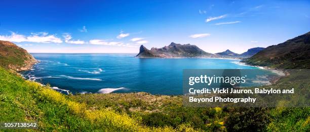 panoramic view over hout bay from the chapman peak drive in cape town, south africa - cape town beach stock pictures, royalty-free photos & images