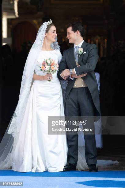 Duchess Sophie of Wurtemberg and Count Maximilien of Andigne leave Saint-Quirin church after their wedding at the Castle of Tegernsee on October 20,...