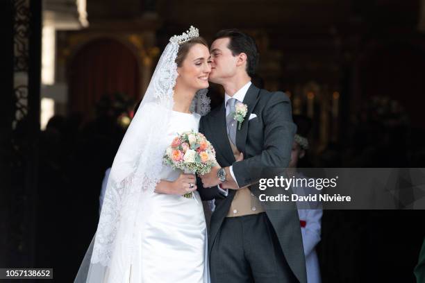 Duchess Sophie of Wurtemberg and Count Maximilien of Andigne leave Saint-Quirin church after their wedding at the Castle of Tegernsee on October 20,...