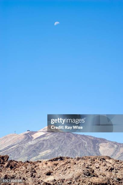 mount teide and the moon in daylight - pico de teide stock pictures, royalty-free photos & images