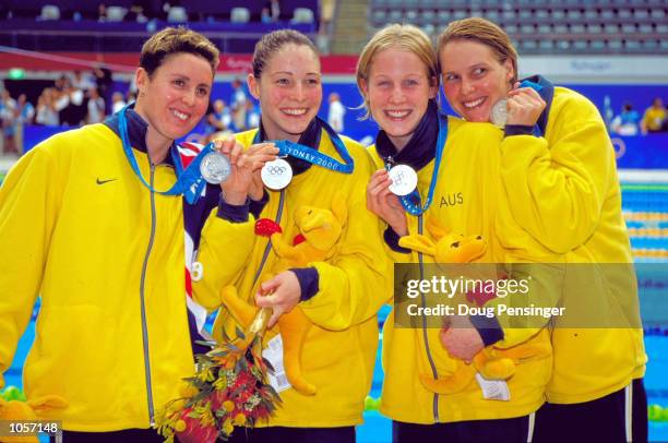 Petria Thomas, Kirsten Thomson, Giaan Rooney and Susie O''Neill of Australia celebrate Silver in the Womens 4x200m Freestyle Relay Final at the...