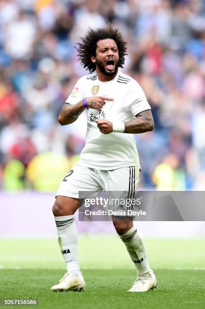 Marcelo of Real Madrid celebrates after scoring his sides first goal during the La Liga match between Real Madrid CF and Levante UD at Estadio...