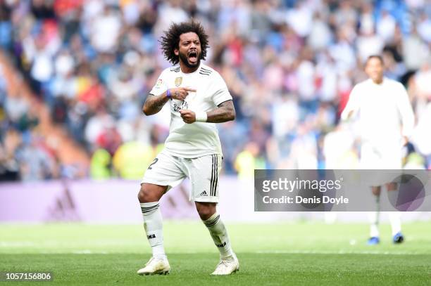 Marcelo of Real Madrid celebrates after scoring his sides first goal during the La Liga match between Real Madrid CF and Levante UD at Estadio...