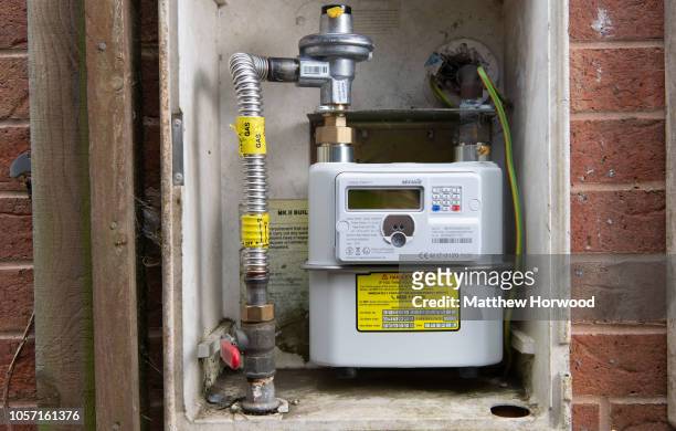 New smart meter installed at a home on October 17, 2018 in Caerphilly, United Kingdom. A smart meter is an electronic device that records consumption...