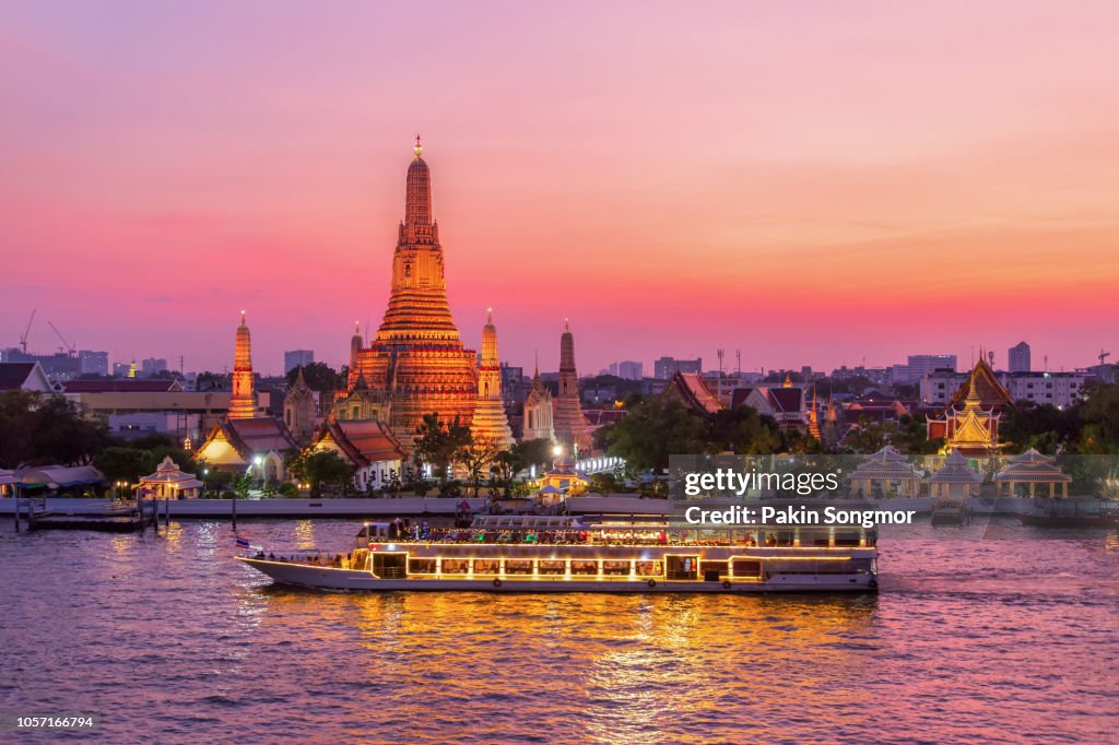 Wat Arun and cruise ship in twilight time