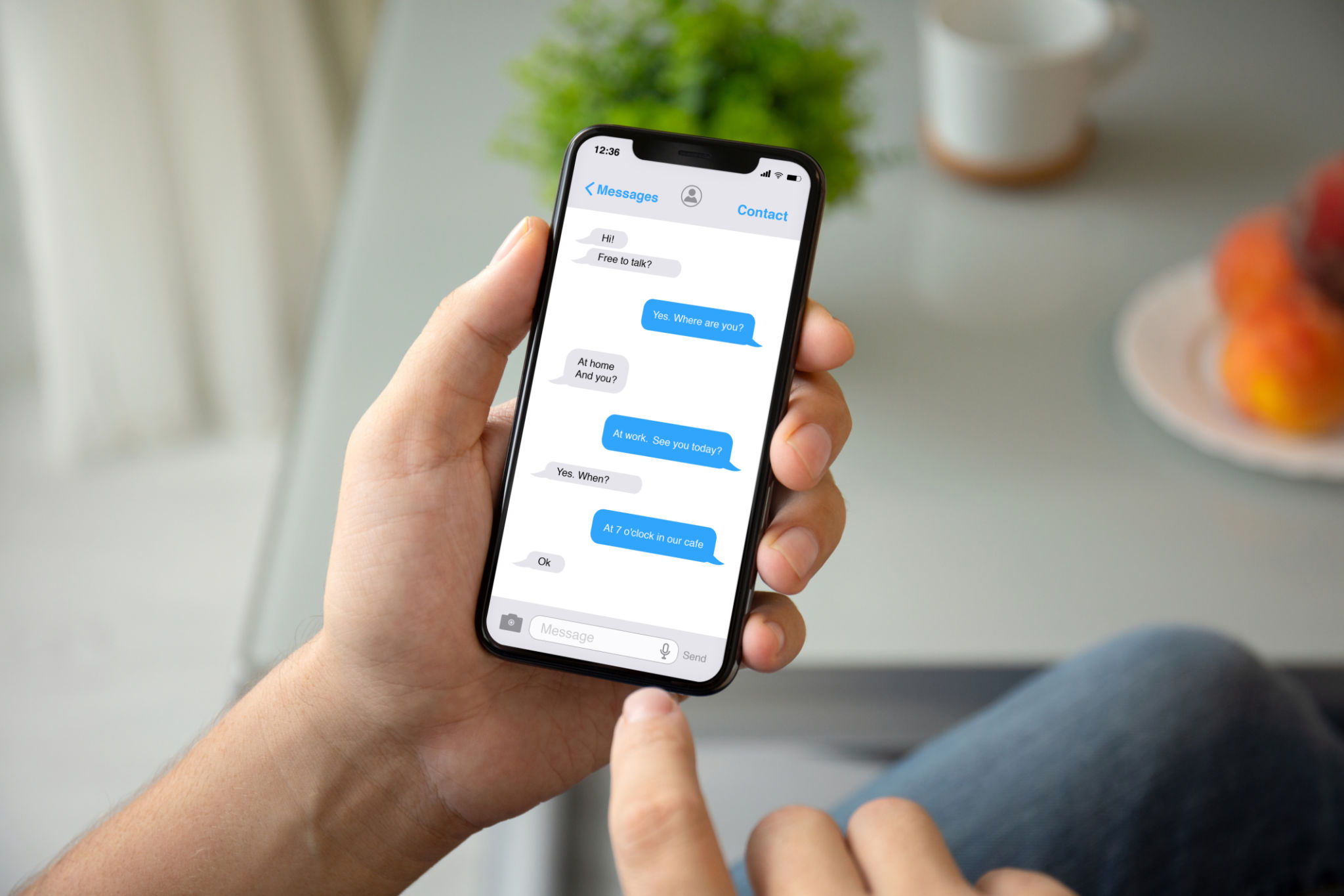 man hand holding phone with app messenger on the screen man hand holding phone with app messenger on the screen