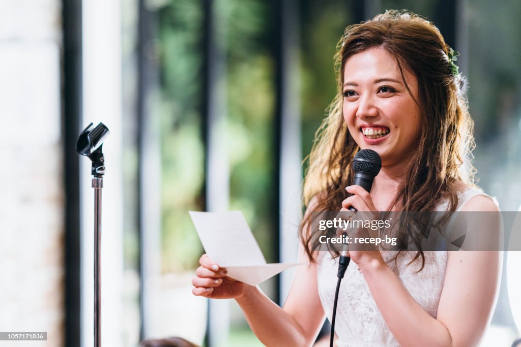Young woman giving speech