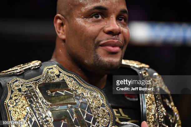 Daniel Cormier celebrates after his submission victory over Derrick Lewis in their UFC heavyweight championship bout during the UFC 230 event inside...