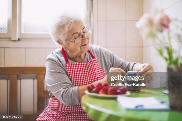 beautiful active senior woman - jam jar stock pictures, royalty-free photos & images