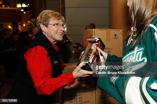 Minnesota Wild hands out Mikko Koivu bobbleheads prior to the game against the Vancouver Canucks at the Xcel Energy Center on October 19, 2010 in...