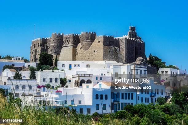 greece, patmos, chora, monastery of saint john the theologian - patmos greece stock pictures, royalty-free photos & images