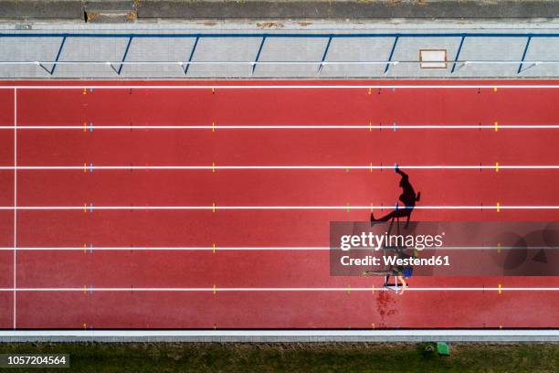 aerial view of hurdler - sports track fotografías e imágenes de stock