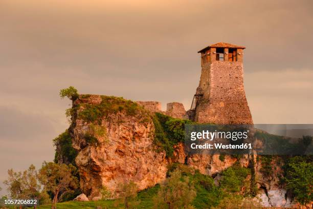 albania, kruje, fortress in evening light - krujë fotografías e imágenes de stock
