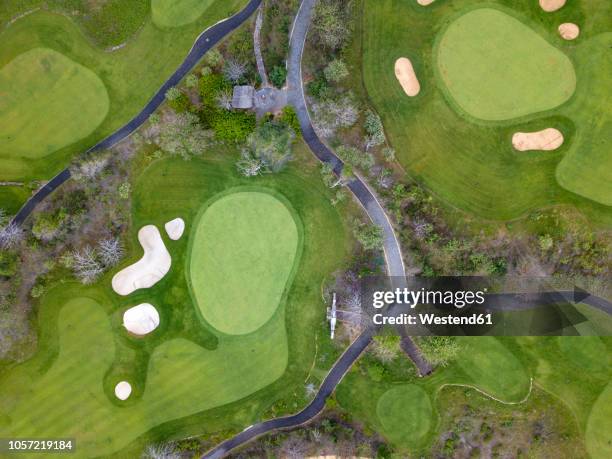 indonesia, bali, aerial view of golf course - bali golf stock pictures, royalty-free photos & images