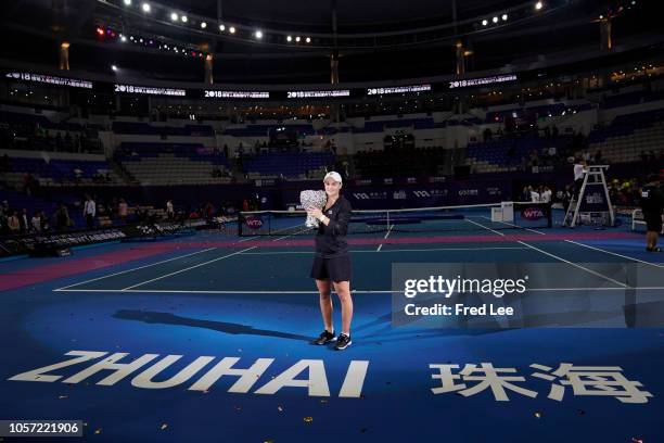 Ashleigh Barty of Australia celebrates with the trophy during the Award Ceremony after winning the women's singles final match against Qiang Wang of...